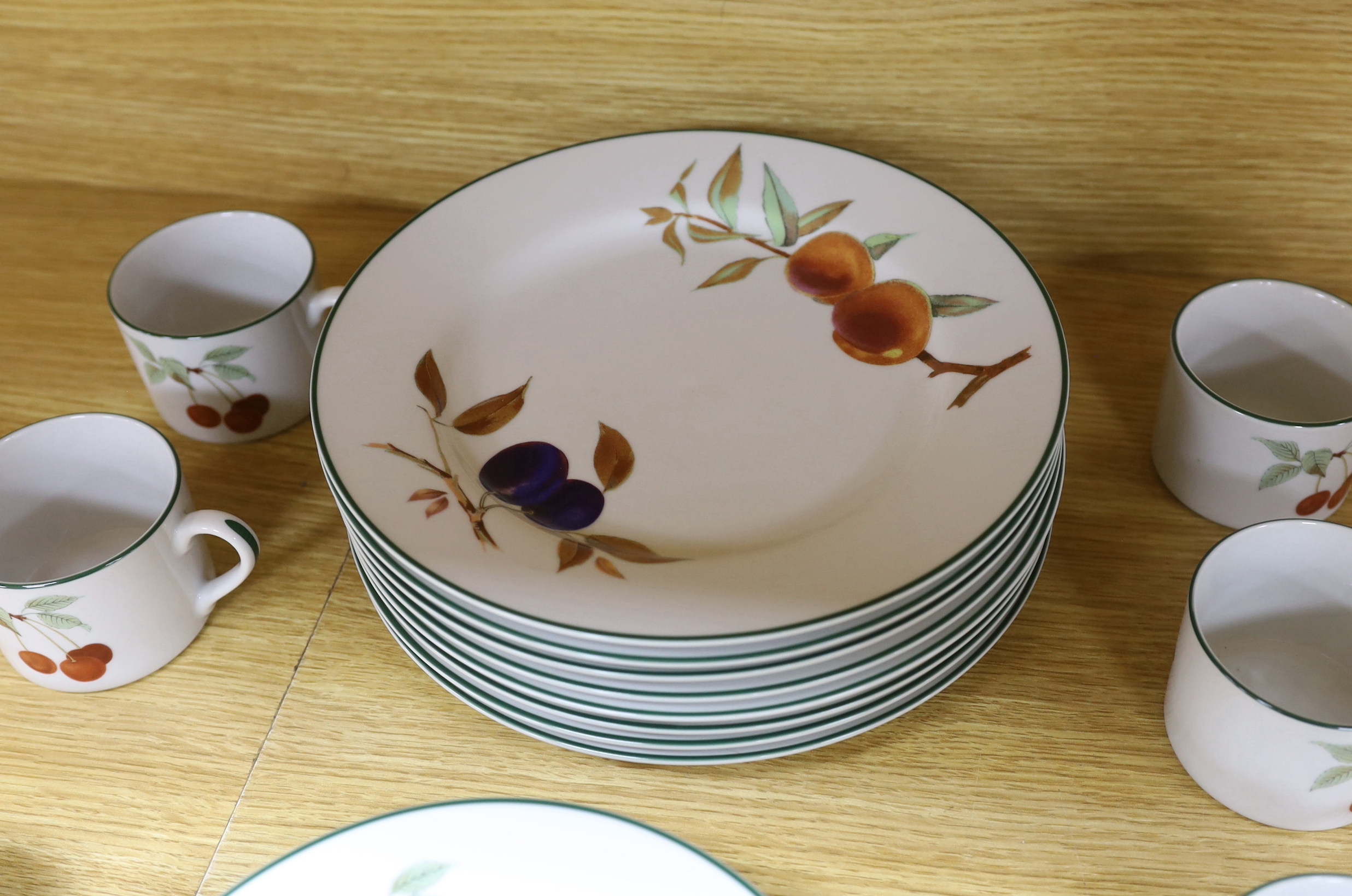 A Royal Worcester “Evesham Vale” eight place setting, dinner and coffee service